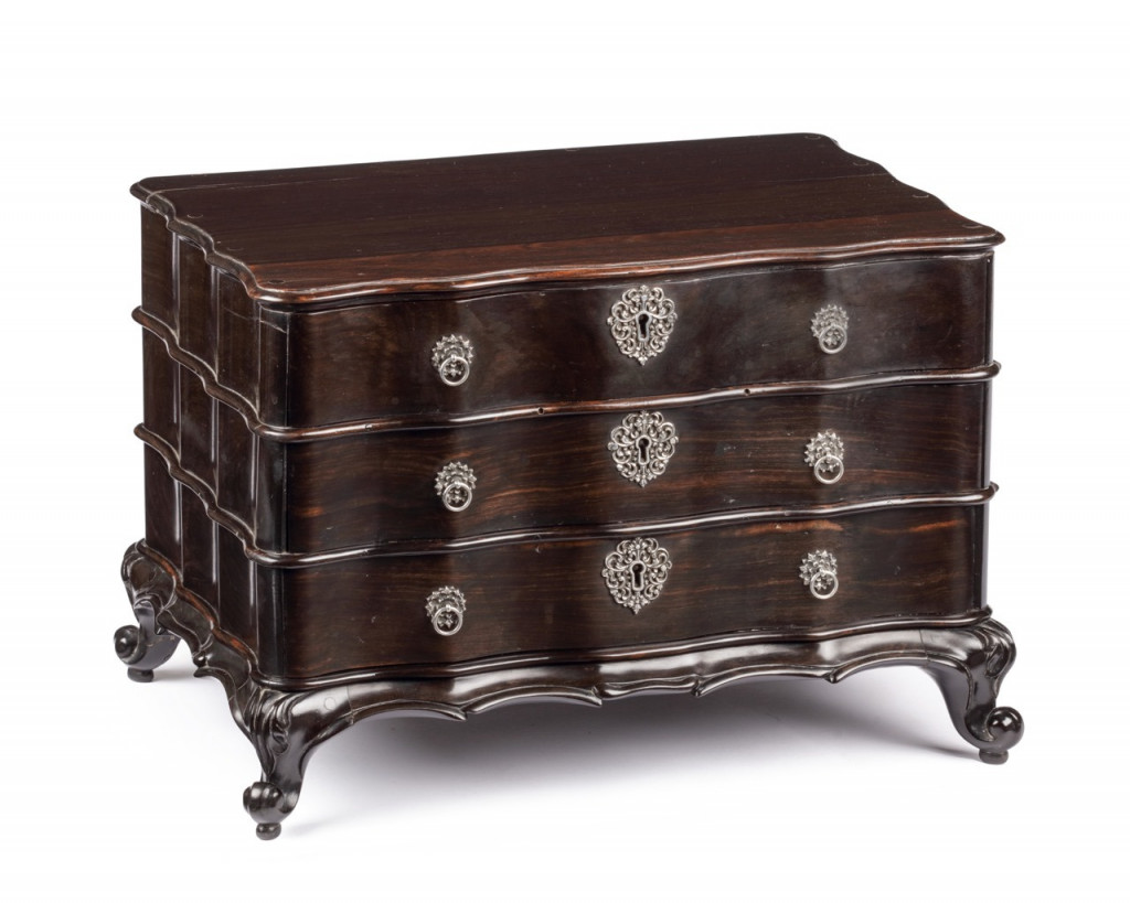 A Dutch-colonial Sri Lankan nedun wood and Indian padouk miniature chest of drawers with silver mounts