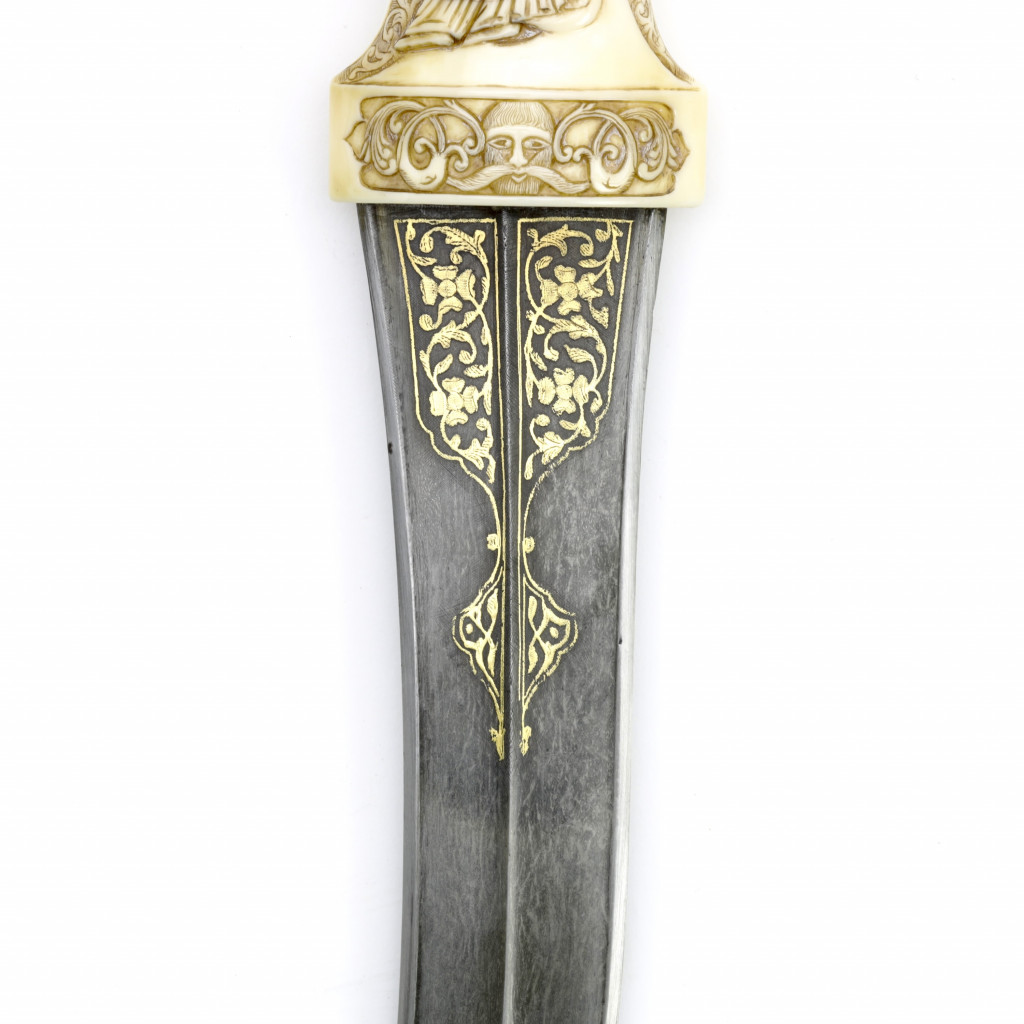 An erotic Islamic Persian dagger with walrus ivory hilt