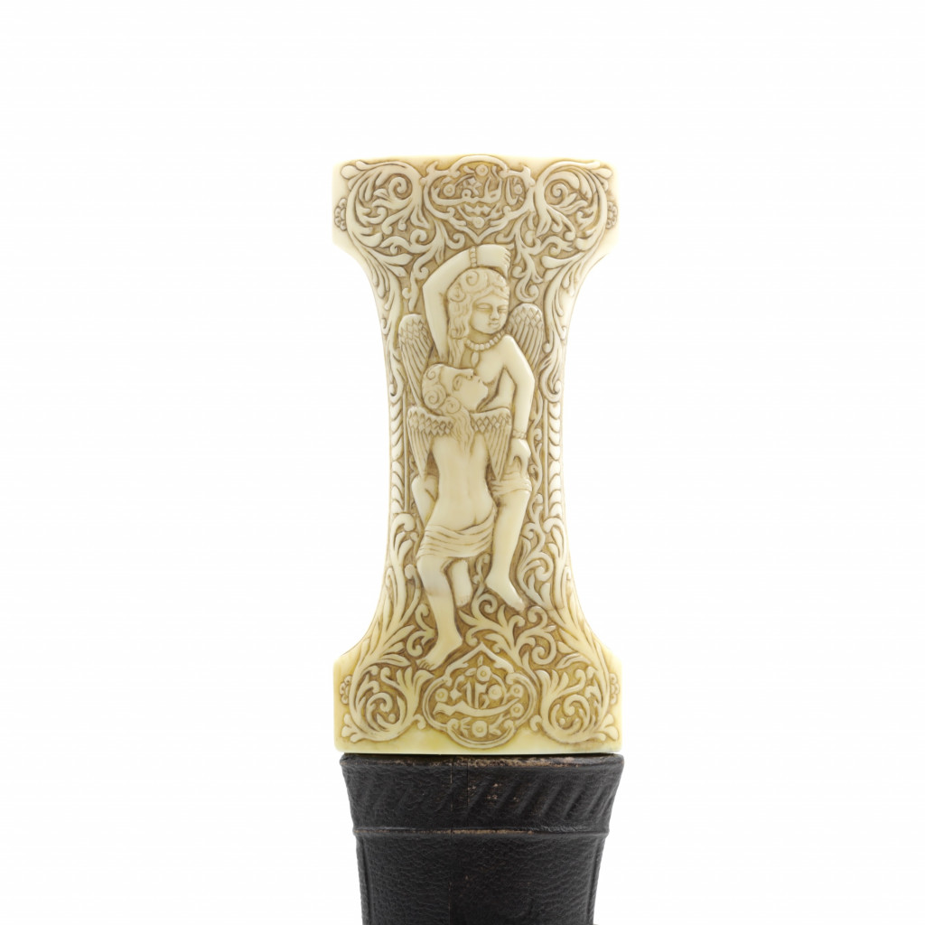 An erotic Islamic Persian dagger with walrus ivory hilt
