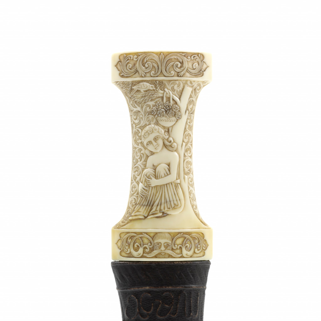 An erotic Islamic Persian dagger with walrus ivory hilt
