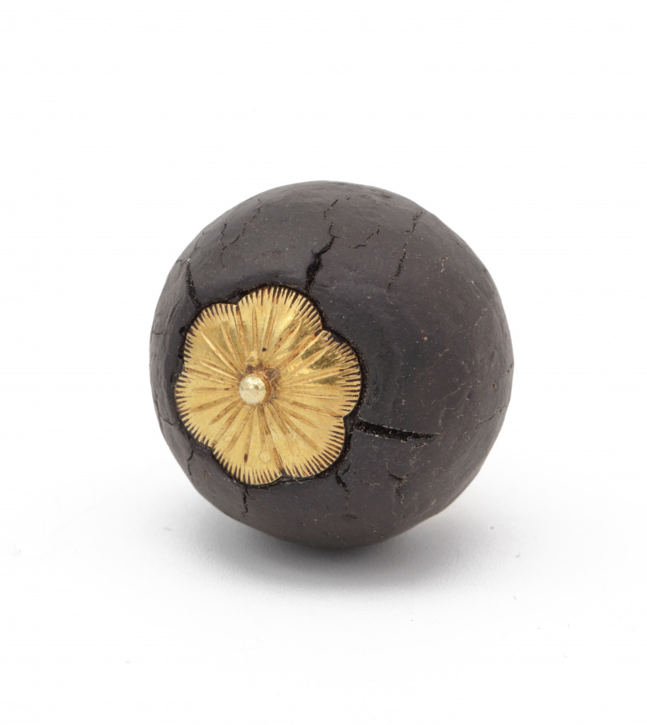 An ambergris and gold Indonesian or Dutch colonial perfume pendant in the form of a mangosteen fruit