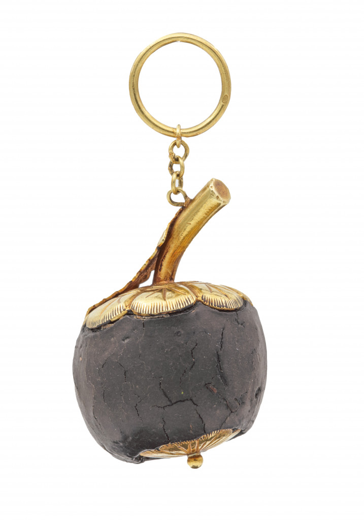 An ambergris and gold Indonesian or Dutch colonial perfume pendant in the form of a mangosteen fruit