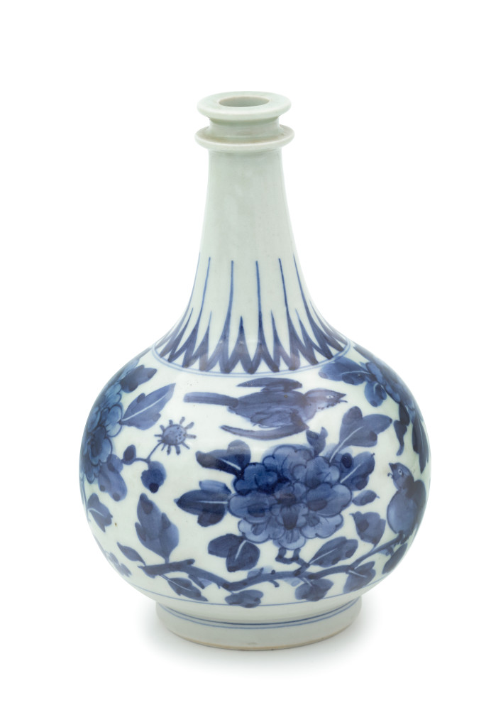 A small Japanese blue-and-white Arita porcelain bottle marked P.VD