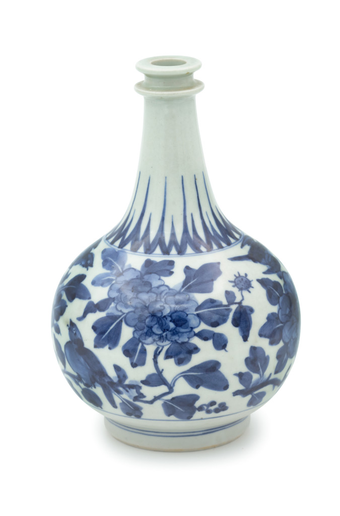 A small Japanese blue-and-white Arita porcelain bottle marked P.VD