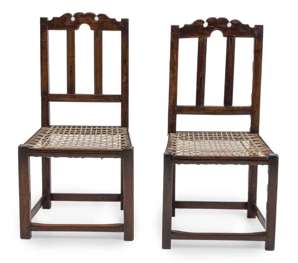 A pair of stinkwood and leather-strip Cape Dutch 'riempie' chairs