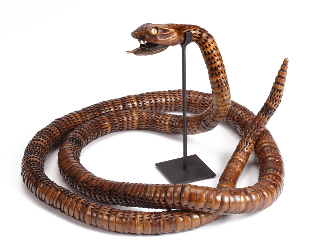 A Japanese articulated wood jizai okimono of a rattle snake by Masakazu