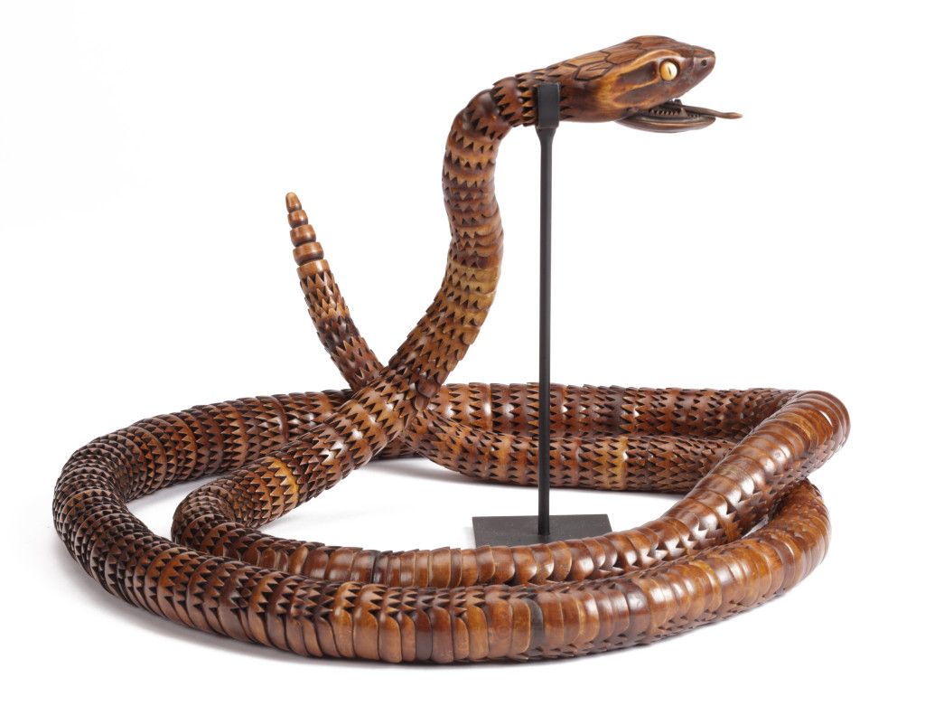 A Japanese articulated wood jizai okimono of a rattle snake by Masakazu