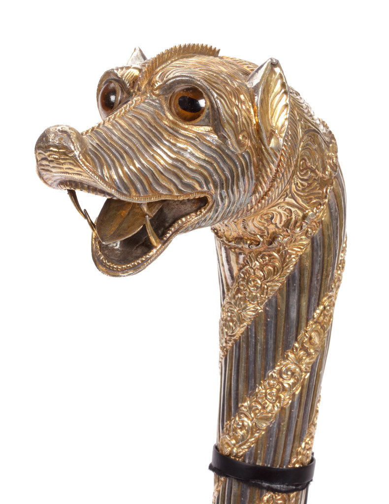 An Indian part-gilt silver-clad ceremonial sceptre or mace with a tiger’s head