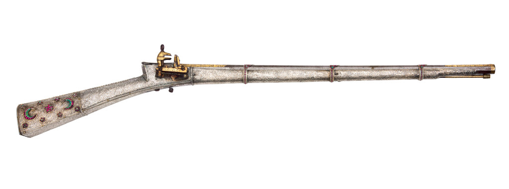 A superb bejewelled gem-set repoussé silver Ottoman miquelet flintlock rifle