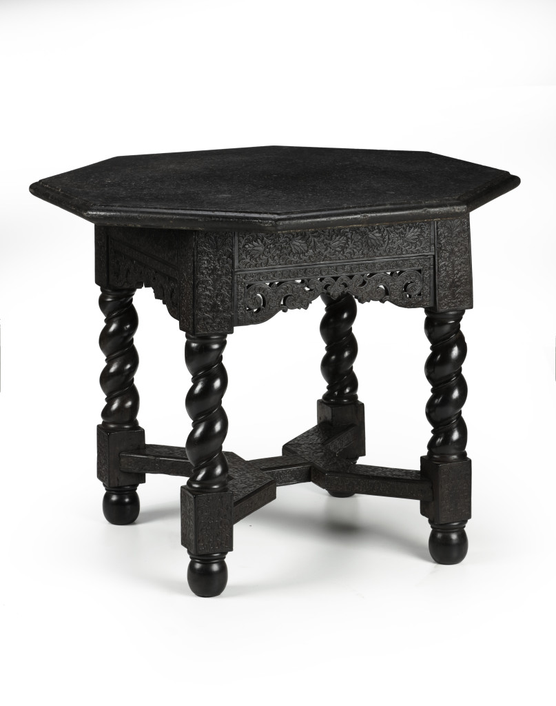 A Dutch-Colonial ebony table with a black hardstone top