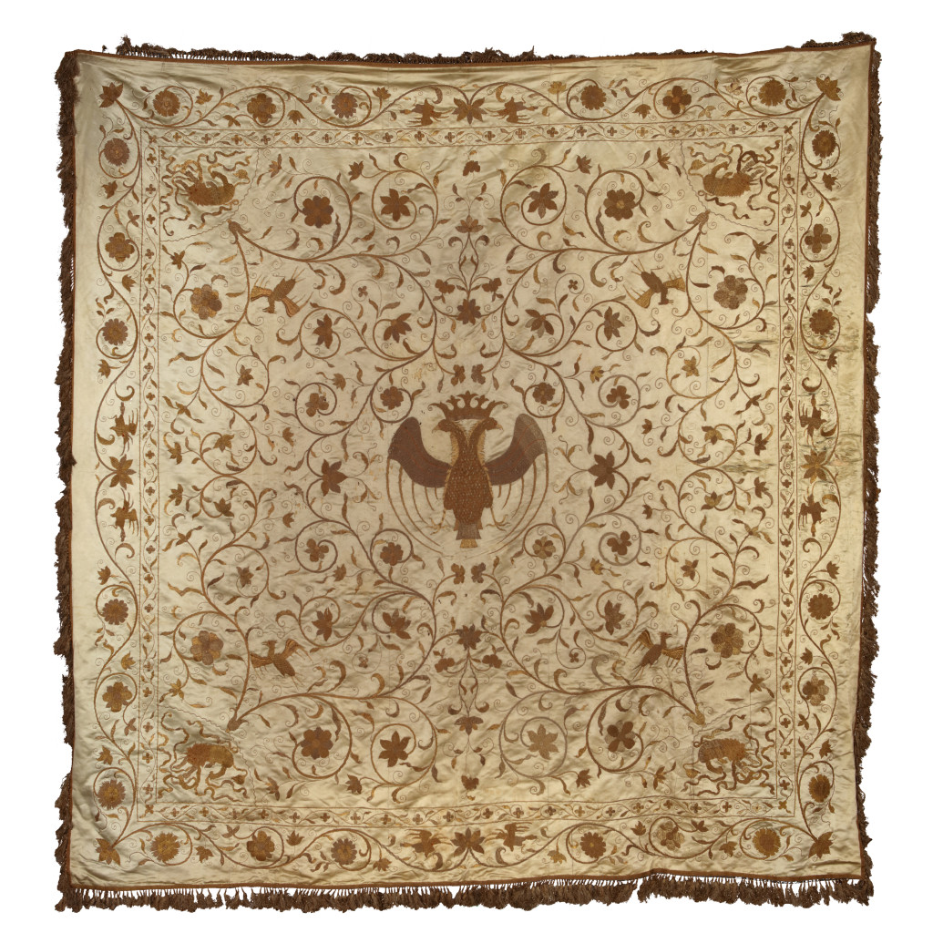 A large Chinese export white gold embroidered silk bed-cover or wall-hanging
