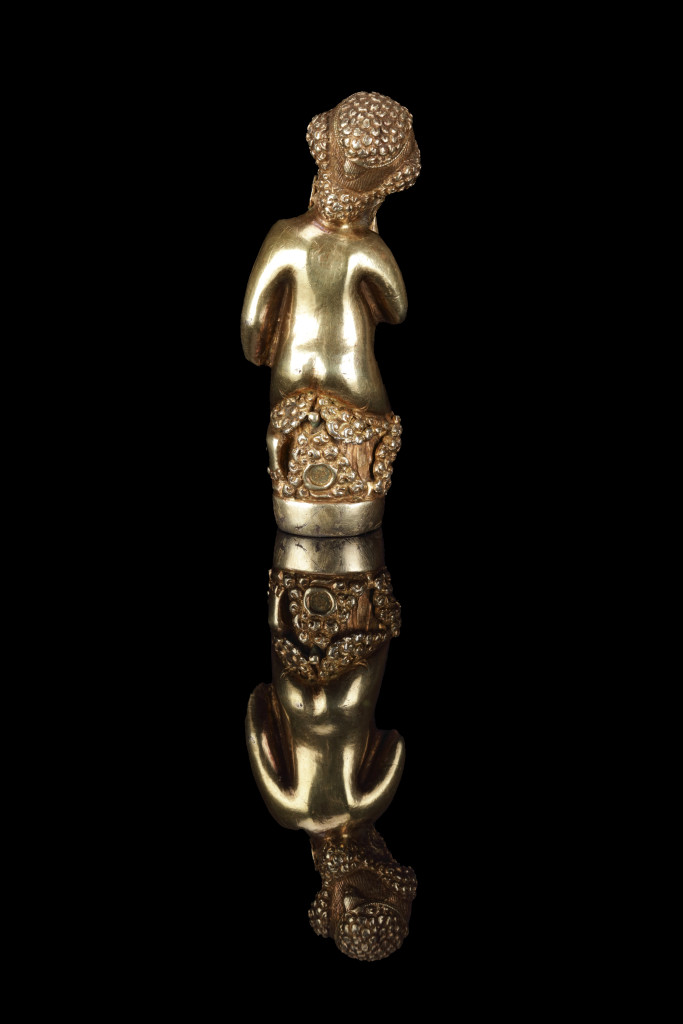A Hindu-Javanese gold kris hilt in the form of a Rakshasa