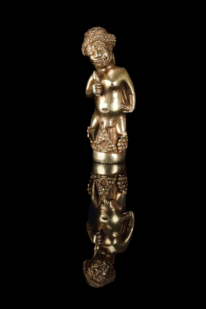 A Hindu-Javanese gold kris hilt in the form of a Rakshasa