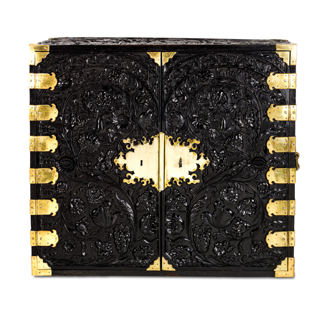 A Dutch colonial ebony cabinet with brass mounts