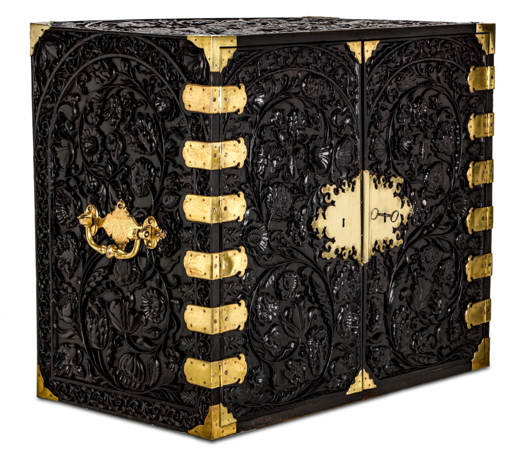 A Dutch colonial ebony cabinet with brass mounts