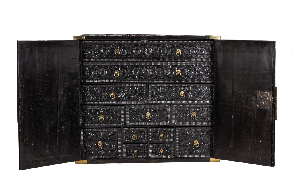 A Dutch colonial ebony cabinet with brass mounts