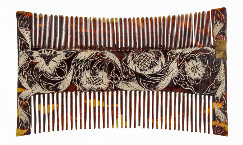 A Jamaican colonial engraved tortoiseshell comb-case and two combs