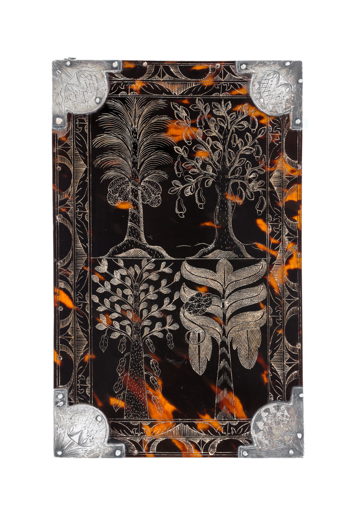 A British-colonial Jamaican engraved tortoiseshell comb-case with silver mounts and a comb