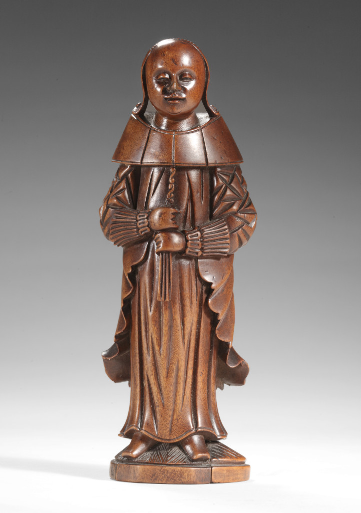 A highly unusual Chinese sandalwood figure of a Dutch lady