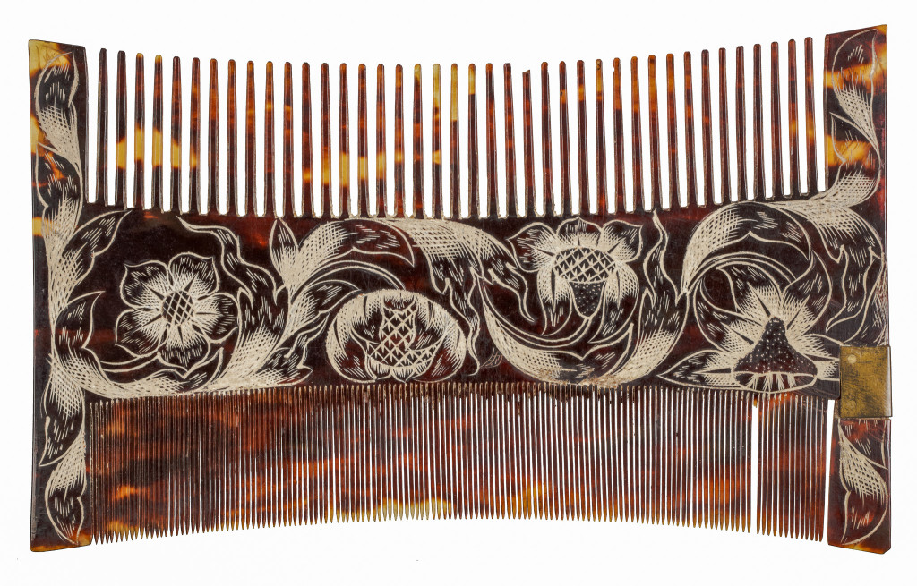 A Jamaican colonial engraved tortoiseshell comb-case and two combs