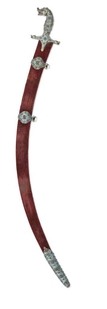 An exceptional Indian diamond, emerald, beryl and ruby inlaid enamelled silver and gold shamshir