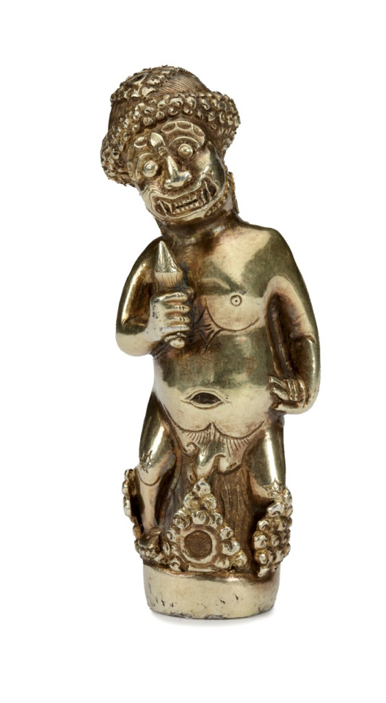 A Hindu-Javanese gold kris hilt in the form of a Rakshasa