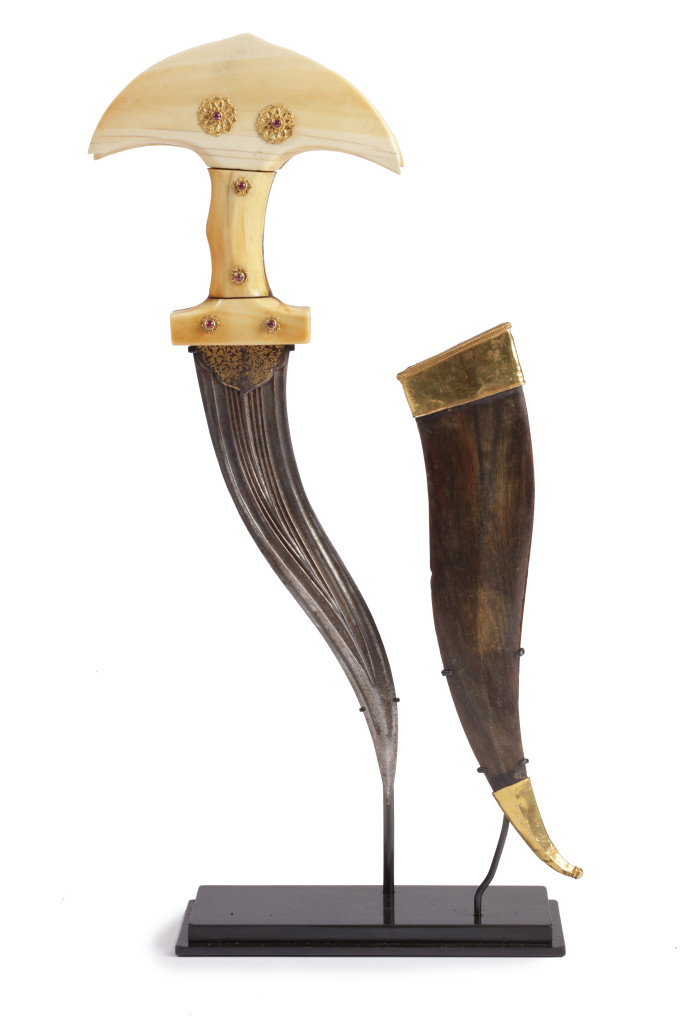 A fine Indian khandjarli dagger with a gold and gem-set ivory hilt