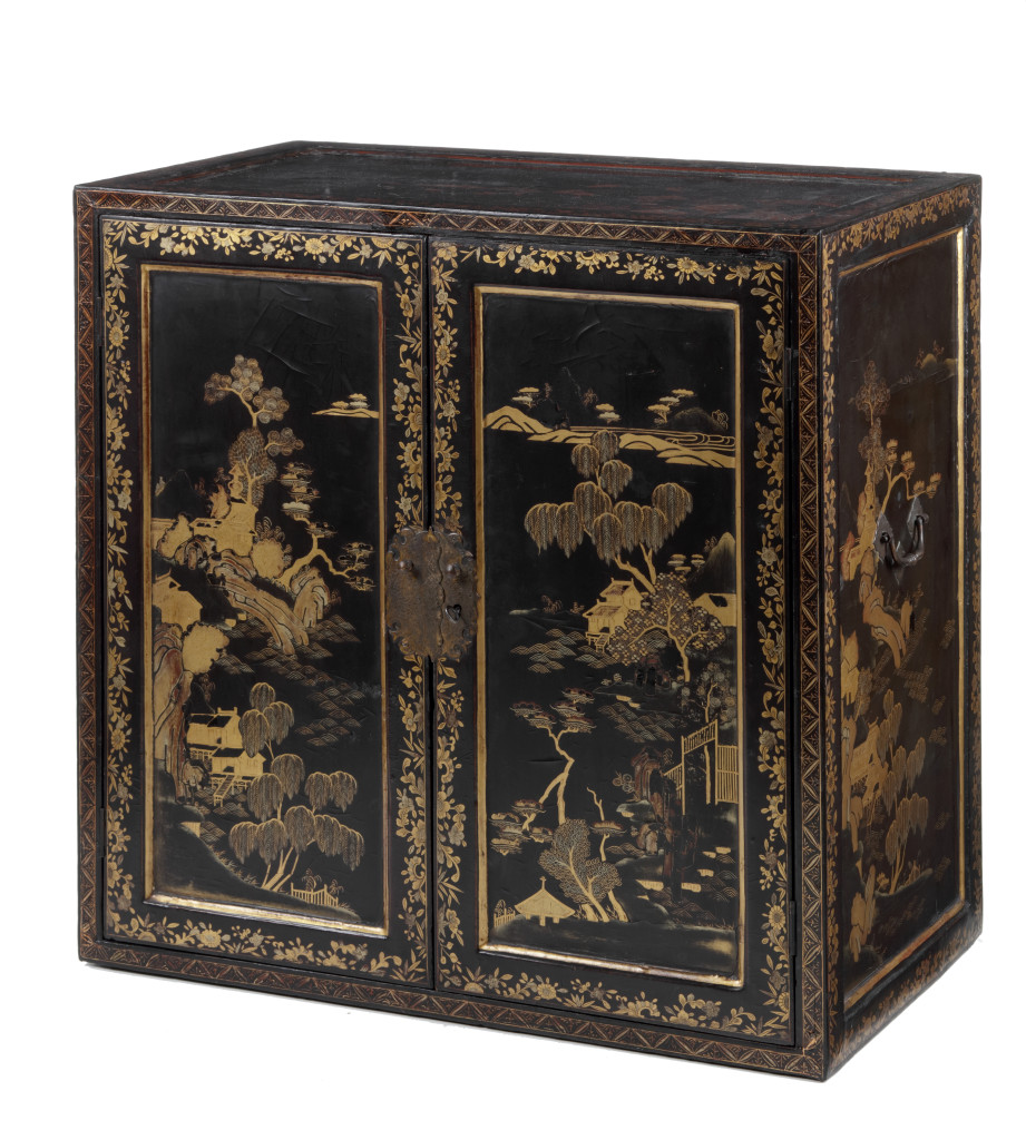 A Chinese black and gold lacquered cabinet with finely made interior with a poem made by Li Bai (701-762)
