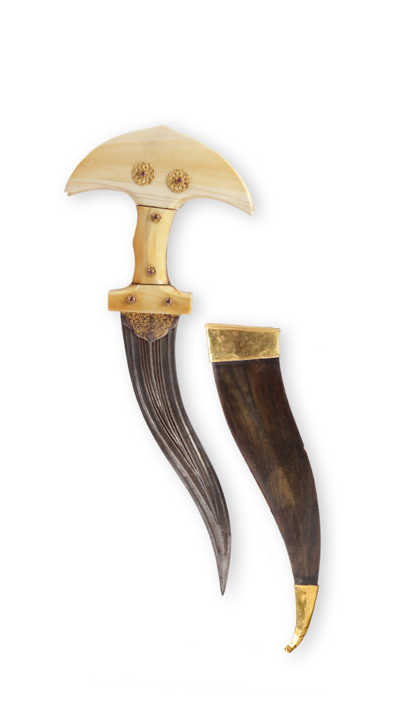 A fine Indian khandjarli dagger with a gold and gem-set ivory hilt
