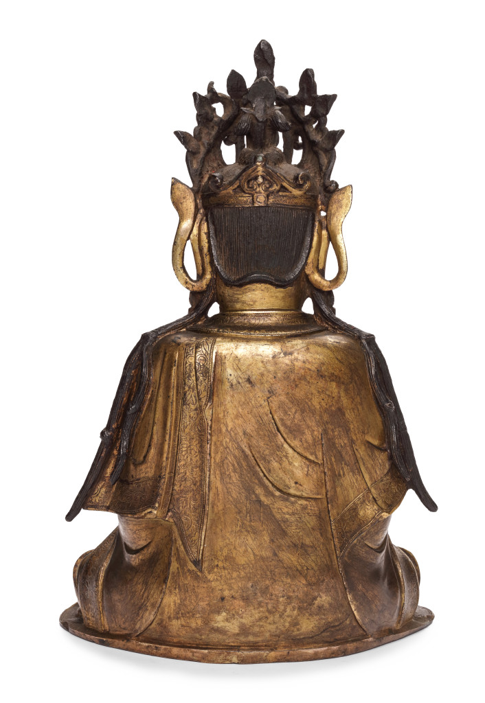 A large magnificently serene Chinese gilt-bronze sculpture of Guanyin