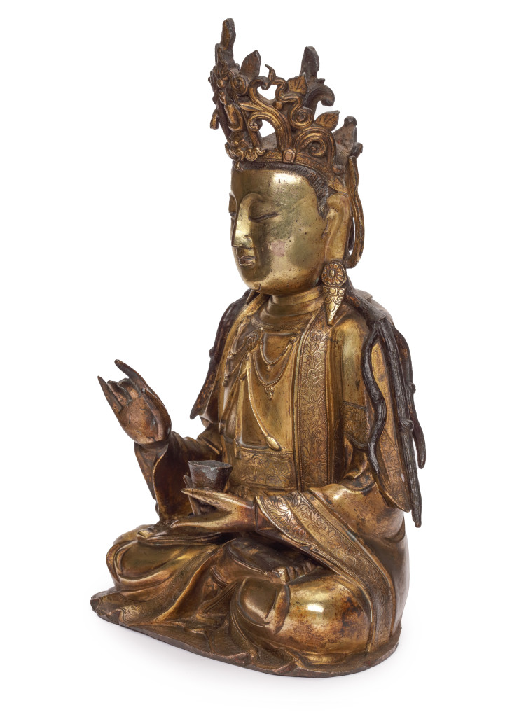 A large magnificently serene Chinese gilt-bronze sculpture of Guanyin