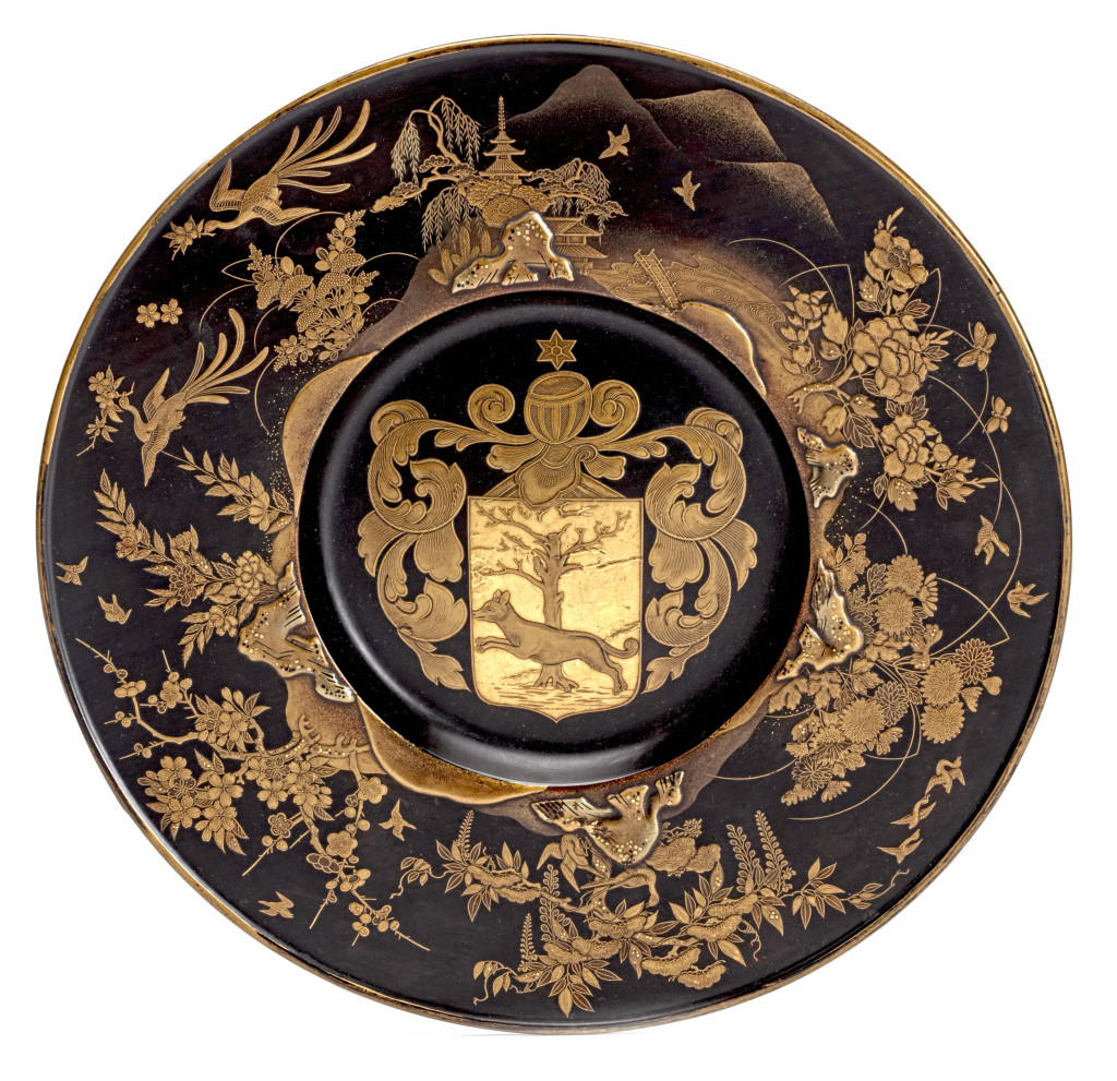 A rare Japanese export lacquer armorial dish with the coat-of-arms of Pieter de Vos