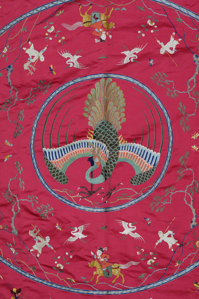 A Chinese red silk embroidered bed-cover for the Dutch market