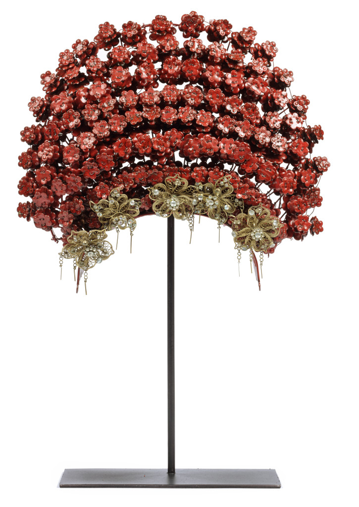 A Minangkabau red-enamelled and brass wedding crown or 'Suntiang'