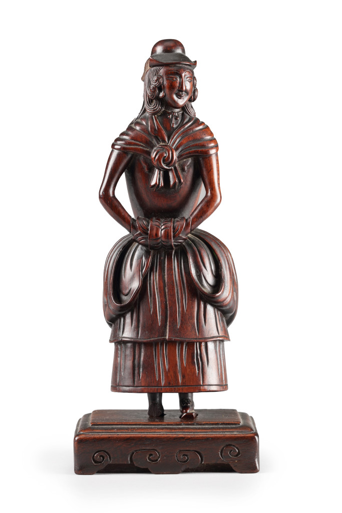 A rare Chinese wood sculpture of a Dutch lady