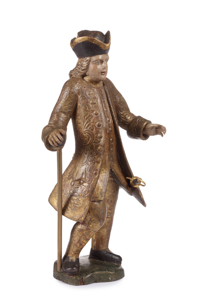 A Chinese walnut, Hu-T'ao, polychrome and gilt sculpture of a European Company official