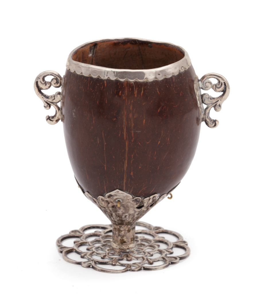 A Spanish-colonial chocolate cup (jícara) with silver mounts