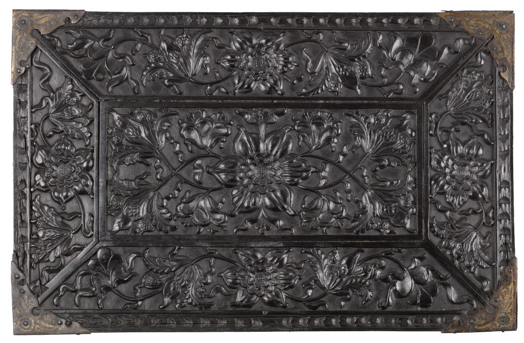 A high-relief carved ebony table cabinet