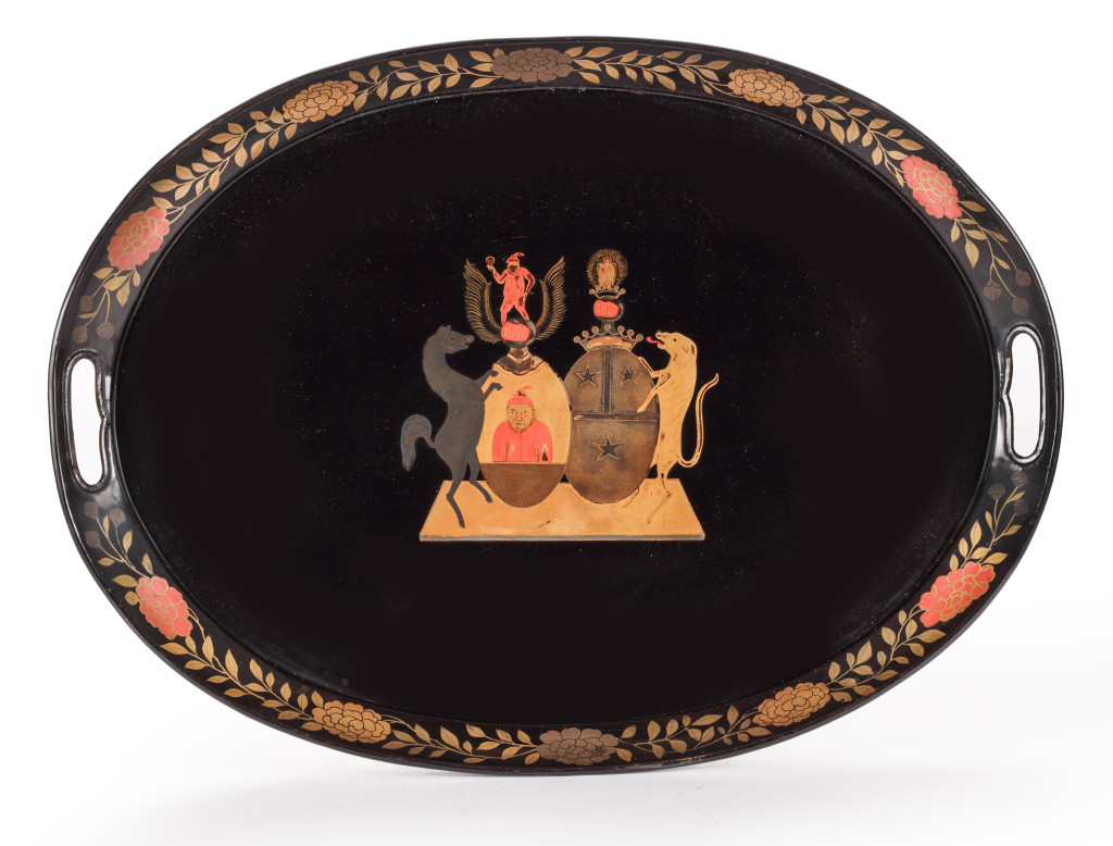 An oval Japanese export lacquer tray decorated with the alliance of the coats of arms of the Mooyaart and Pauw families