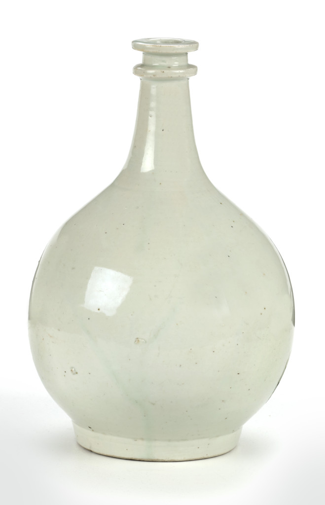 A Japanese porcelain undecorated bottle