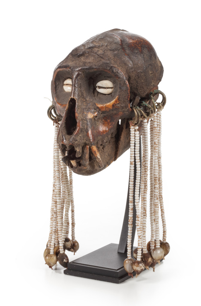 A pair of monkey skull amulets