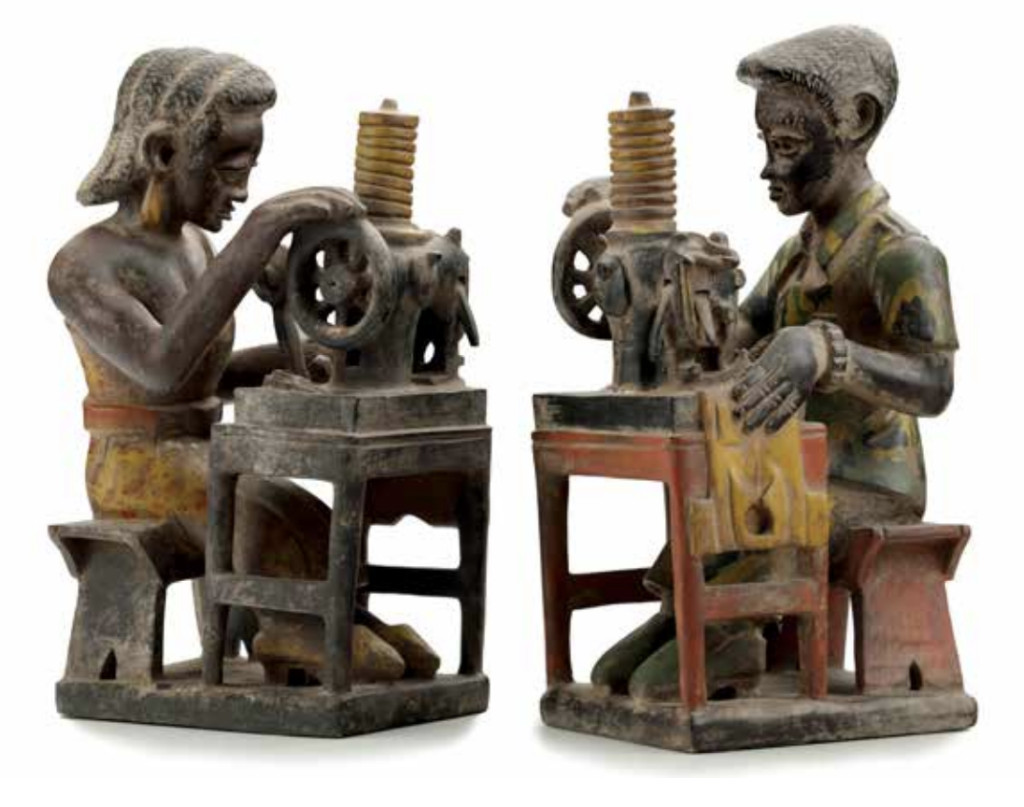 A charming pair of Ivory Coast polychrome wood sculptures of dressmakers