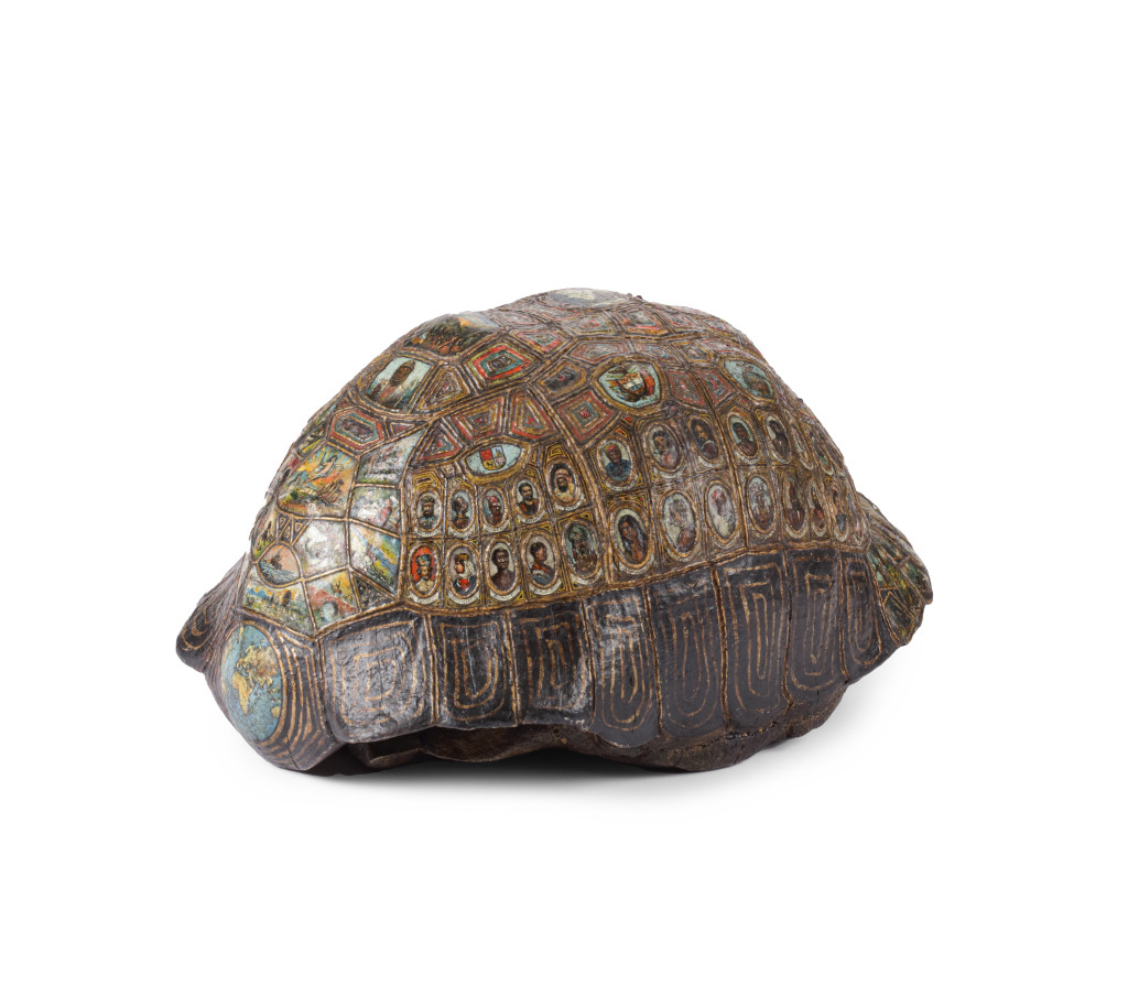 A highly unusual carved painted, gilt and gem-set tortoise carapace resembling the mythical Cosmic or World-bearing Turtle