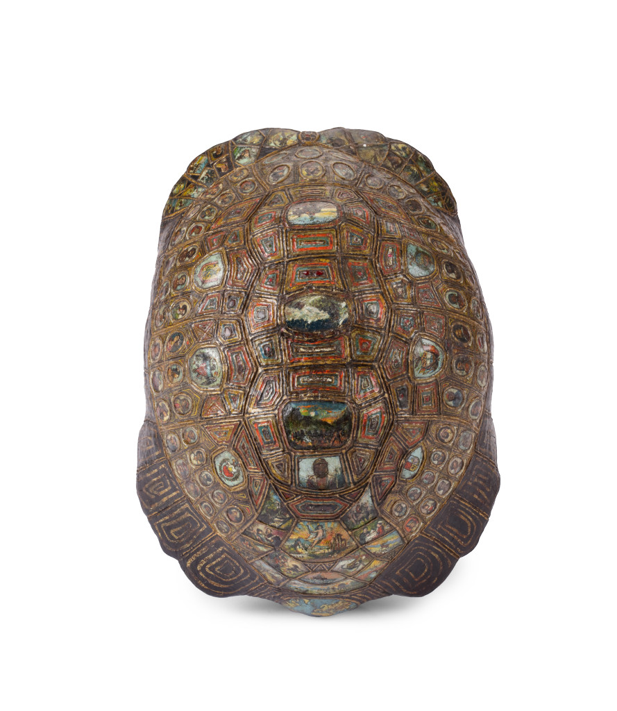 A highly unusual carved painted, gilt and gem-set tortoise carapace resembling the mythical Cosmic or World-bearing Turtle