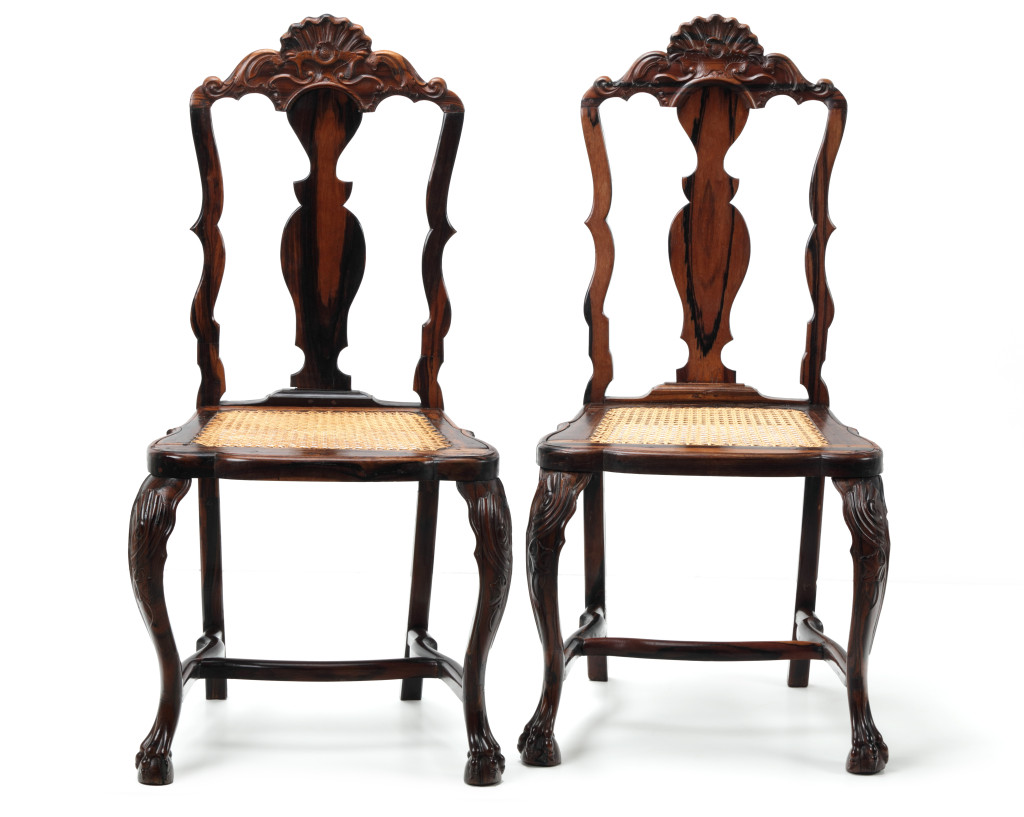 A pair of Sri Lankan coromandel wood high back chairs