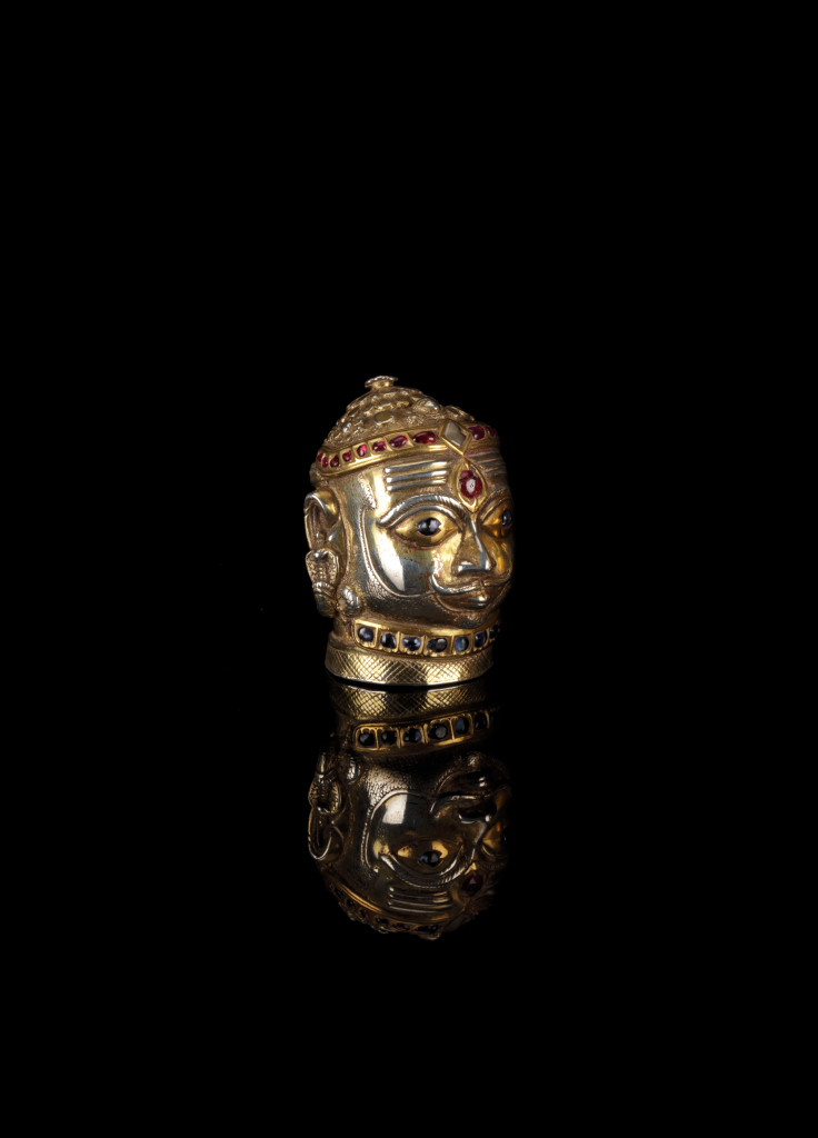 A gem-set silver-gilt Shiva Mukhalingam head