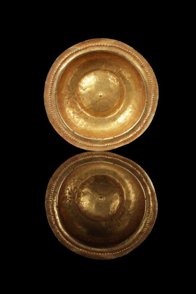 A collection of Tanimbar gold repoussé dishes