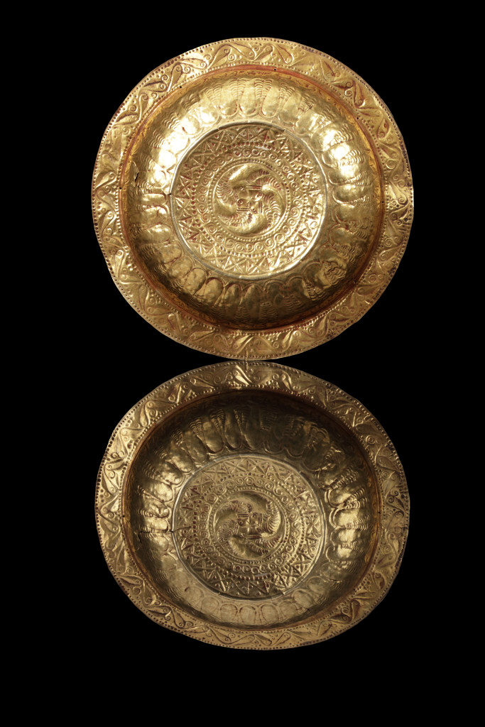 A collection of Tanimbar gold repoussé dishes