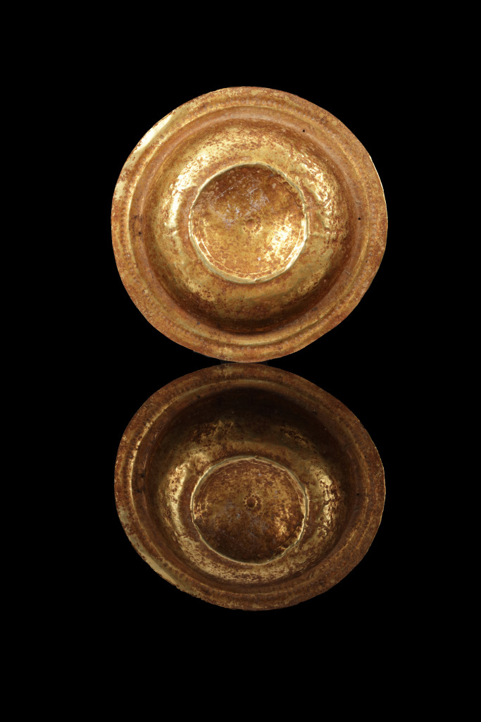 A collection of Tanimbar gold repoussé dishes