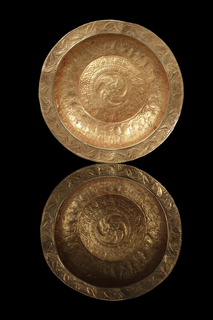 A collection of Tanimbar gold repoussé dishes